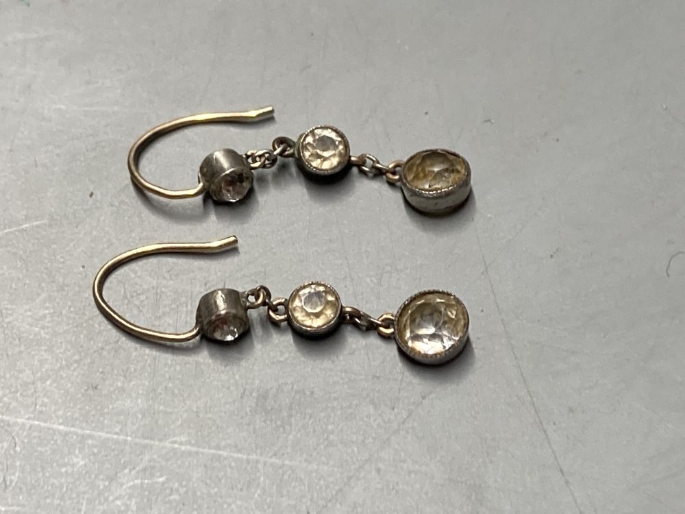 Two yellow metal-mounted shell pendants, a moonstone ring , a similar pair of drop earrings and a mourning brooch,